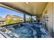 Relaxing hot tub on a covered patio, perfect for enjoying the outdoors at 8259 Arapahoe Peak St, Littleton, CO 80125