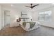 Tranquil bedroom with a plush bed, soft carpet, a window, and modern decor for a relaxing retreat at 645 Flintwood Pl, Lafayette, CO 80026