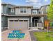 Charming two-story home with a two-car garage and a welcoming front porch at 645 Flintwood Pl, Lafayette, CO 80026