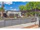 Outdoor wine house seating area with wood planters and shade structures at 645 Flintwood Pl, Lafayette, CO 80026