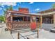 Charming outdoor restaurant with a rustic design featuring wood accents and a welcoming open-air seating area at 645 Flintwood Pl, Lafayette, CO 80026