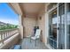 Private condo balcony with ample space for outdoor seating and sliding glass door at 9518 W San Juan Cir # 307, Littleton, CO 80128