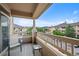 Outdoor balcony overlooking lush greenery and scenic mountain views at 9518 W San Juan Cir # 307, Littleton, CO 80128