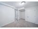 Finished basement with closet and doorways, new carpet, and neutral paint at 7275 E 8Th Ave, Denver, CO 80220