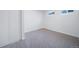 Finished basement with neutral carpet, and a window at 7275 E 8Th Ave, Denver, CO 80220