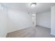 Finished basement has neutral carpet and a doorway at 7275 E 8Th Ave, Denver, CO 80220
