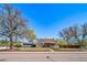 Charming single-Gathering home with a welcoming front porch, lush lawn, and mature trees at 7275 E 8Th Ave, Denver, CO 80220
