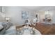 Bright living room showcasing hardwood floors and view into dining area at 7275 E 8Th Ave, Denver, CO 80220
