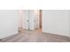 Bright bedroom with neutral carpet, white walls, and doors at 8386 Cokedale Cir, Littleton, CO 80125