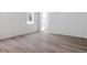 Bright room showcasing a neutral color palette, hardwood floors and contemporary design at 8386 Cokedale Cir, Littleton, CO 80125