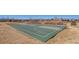 Outdoor community basketball court with well-maintained surface and hoops in a grassy setting at 4217 S Jericho St, Aurora, CO 80013