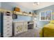 Colorful bedroom featuring ample storage, built-in desk space, and a playful design for creative inspiration at 4217 S Jericho St, Aurora, CO 80013