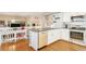 Bright and airy kitchen featuring modern appliances, sleek countertops, and ample cabinet space at 4217 S Jericho St, Aurora, CO 80013