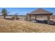 Fun-filled community playground area with slides, swings, a covered picnic area, and grassy fields at 4217 S Jericho St, Aurora, CO 80013
