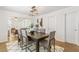 Stylish dining area with a sleek table, comfortable seating, and modern lighting fixtures at 4353 Sherman St, Denver, CO 80216