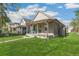 Charming home with a covered front porch, ideal for enjoying the outdoors with curb appeal at 4353 Sherman St, Denver, CO 80216
