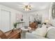 Open-concept living area with tasteful furnishings and views into the dining space at 4353 Sherman St, Denver, CO 80216