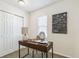 Office space with desk, natural light, and sliding closet doors at 4353 Sherman St, Denver, CO 80216