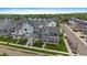 Aerial view showcasing the neighborhood, featuring well-maintained lawns and street access at 397 East St, Louisville, CO 80027