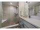 Modern bathroom featuring a walk-in shower with a bench, sleek fixtures, and a stylish vanity at 397 East St, Louisville, CO 80027