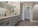Elegant bathroom features double vanity, modern fixtures, and separate shower, providing a spa-like experience at 397 East St, Louisville, CO 80027