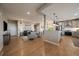 Bright and airy living room with an open concept, seamlessly connecting to the modern kitchen at 397 East St, Louisville, CO 80027