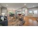 Spacious and open living area flows into the dining and kitchen areas, perfect for entertaining guests at 397 East St, Louisville, CO 80027