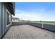 Large, bare outdoor deck offers stunning views of the natural landscape, next to modern home at 397 East St, Louisville, CO 80027