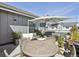Stylish outdoor deck with patio furniture, potted plants, and neighborhood views, perfect for entertaining and relaxing at 397 East St, Louisville, CO 80027