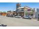 Street with various shops and restaurants, showcasing charming architecture and convenient parking at 397 East St, Louisville, CO 80027