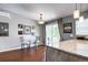 Cozy dining area with sliding door access to the deck and stainless steel appliances at 4833 S Pitkin Ct, Aurora, CO 80015