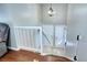 Inviting entryway showcases new stairs and lighting, creating a warm and modern ambiance at 4833 S Pitkin Ct, Aurora, CO 80015