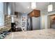 Well-equipped kitchen with stainless steel appliances, modern cabinetry, and sleek countertops at 4833 S Pitkin Ct, Aurora, CO 80015