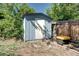 Exterior shot of shed located in fenced backyard at 4833 S Pitkin Ct, Aurora, CO 80015