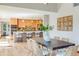 Stylish dining room with an open layout to the kitchen and lots of natural light; great for entertaining at 6054 S Akron Way, Greenwood Village, CO 80111