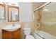 Cozy bathroom featuring a shower, vanity, and marble style tiling at 850 W Moorhead Cir # 3L, Boulder, CO 80305