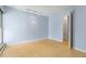 Minimalist bedroom showcasing hardwood floors, bright lighting, and a spacious closet at 850 W Moorhead Cir # 3L, Boulder, CO 80305