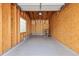 Unfinished garage with drywall, a window, and shelving at 850 W Moorhead Cir # 3L, Boulder, CO 80305