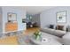 Comfortable living room featuring a cozy seating area with a view into the dining space at 850 W Moorhead Cir # 3L, Boulder, CO 80305