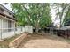 Backyard with large trees, fencing, and patio at 9290 Quitman St, Westminster, CO 80031