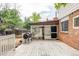 Backyard featuring a deck, a grill, and a screened-in porch at 9290 Quitman St, Westminster, CO 80031