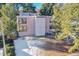 Aerial view of a two-story home with a large yard at 13682 W Virginia Dr, Lakewood, CO 80228