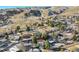 High-angle view of a house nestled in a neighborhood with mountain backdrop; ideal location shown at 13682 W Virginia Dr, Lakewood, CO 80228