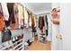 Large walk-in closet with ample shelving and storage at 13682 W Virginia Dr, Lakewood, CO 80228