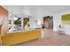 Mid-century modern living room with hardwood floors and a view at 13682 W Virginia Dr, Lakewood, CO 80228