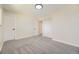 Bedroom with neutral paint, carpet, closet, and white doors offer a clean and inviting space at 610 S Xenon Ct, Lakewood, CO 80228