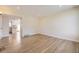 Bright living room featuring hardwood floors, fresh paint, and recessed lighting at 610 S Xenon Ct, Lakewood, CO 80228