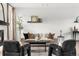 Open living room with a contemporary fireplace, comfortable seating, and stylish decor at 11825 Meadowood Ln, Parker, CO 80138