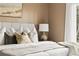 Comfortable main bedroom with neutral tones, a large bed, and a window with natural light at 11825 Meadowood Ln, Parker, CO 80138