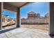 View from covered patio of backyard and nearby homes at 4729 Twelve Oaks Way, Castle Rock, CO 80104